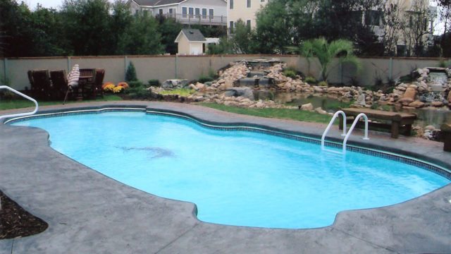 inground pool, water feature swimming pool Outer Banks, OBX water features, Currituck water fall swimming pool