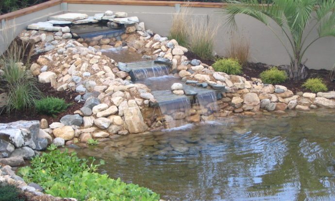 hardscape water feature concrete stamp outer bank obx nc southern scapes pool and landscape design